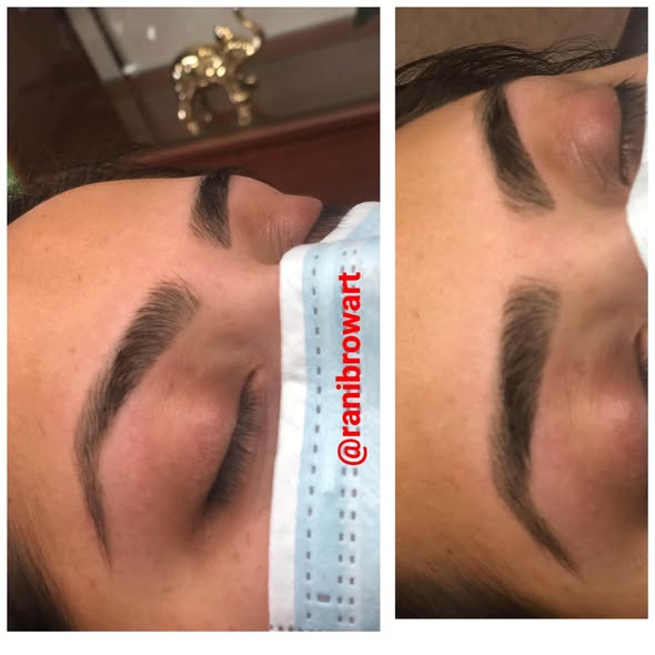 A brow being measured during shaping so both sides finish the same length